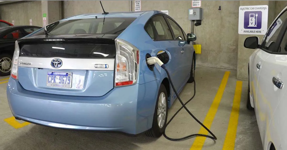 EV auto plugged into garage wall