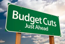 budget cuts just ahead sign