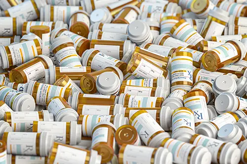 stack of prescription medication bottles